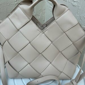 cream woven tote bag made from vegan leather